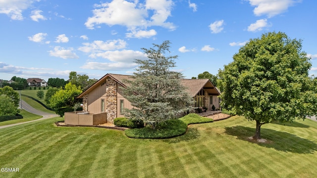 1505 Canterbury Ln, Sevierville, TN 37862 - view of front of home featuring stone siding and a front yard