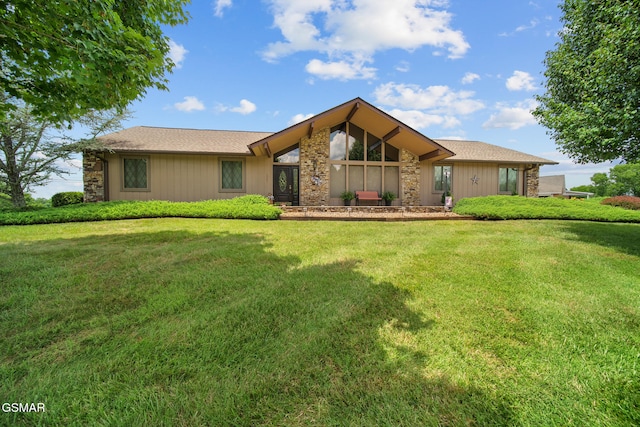 1505 Canterbury Ln, Sevierville, TN 37862 - mid-century modern home with a front yard and stone siding