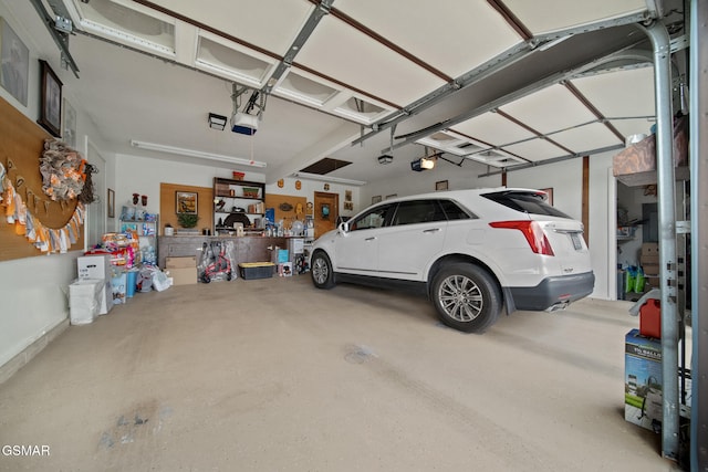 1505 Canterbury Ln, Sevierville, TN 37862 - garage featuring a garage door opener