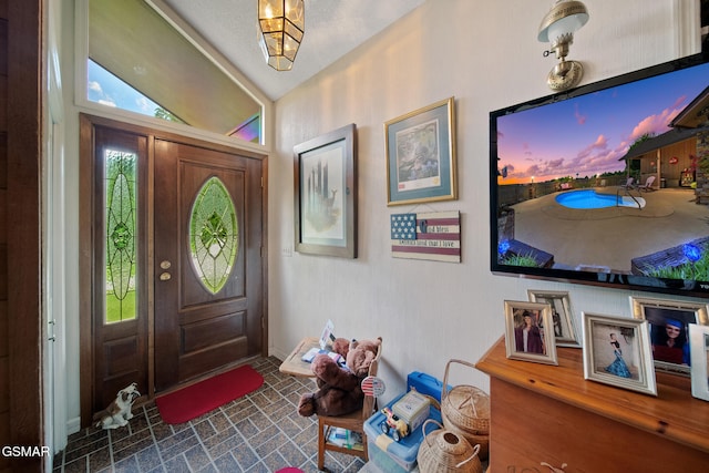 1505 Canterbury Ln, Sevierville, TN 37862 - foyer featuring brick patterned flooring and lofted ceiling