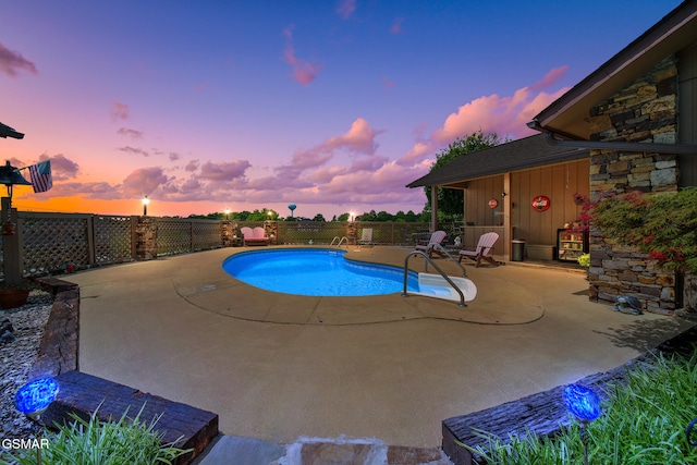 1505 Canterbury Ln, Sevierville, TN 37862 - pool at dusk featuring a patio area