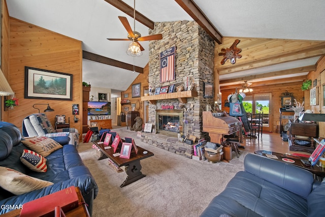 1505 Canterbury Ln, Sevierville, TN 37862 - living area featuring wooden walls, beam ceiling, a ceiling fan, a stone fireplace, and carpet
