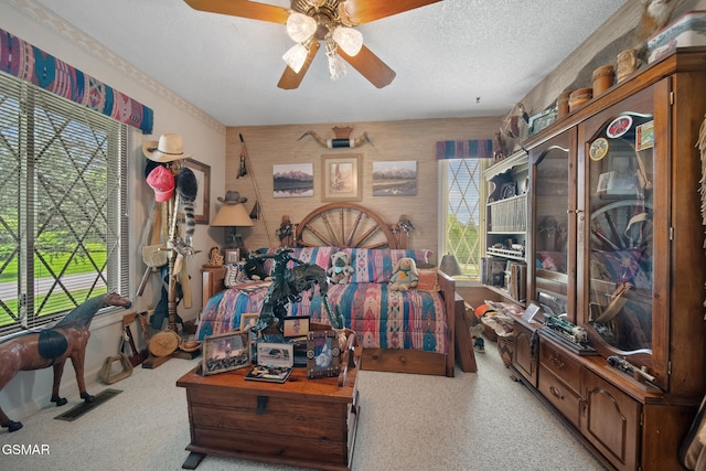 1505 Canterbury Ln, Sevierville, TN 37862 - bedroom with carpet flooring, a ceiling fan, and a textured ceiling
