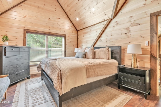 bedroom with vaulted ceiling, wood walls, dark wood-style flooring, and wood ceiling