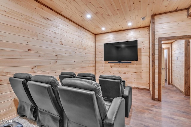 cinema featuring wooden walls, visible vents, wood ceiling, wood finished floors, and recessed lighting