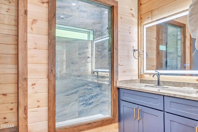 bathroom with wooden walls and vanity