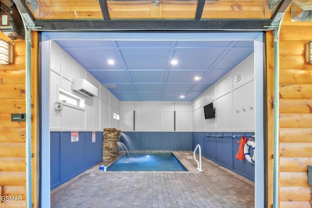 view of swimming pool featuring a wall unit AC