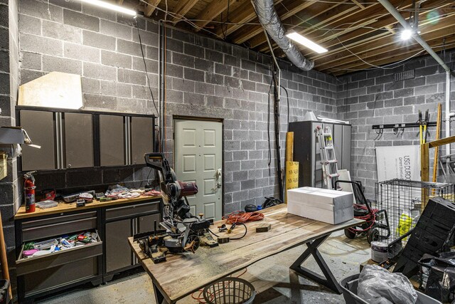 interior space featuring a workshop area