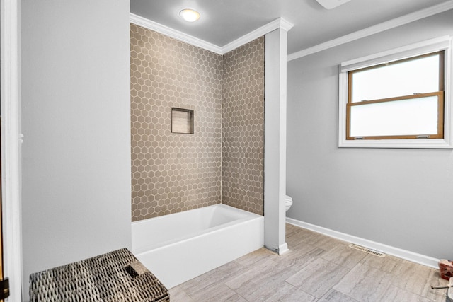 bathroom featuring toilet, crown molding, and independent shower and bath