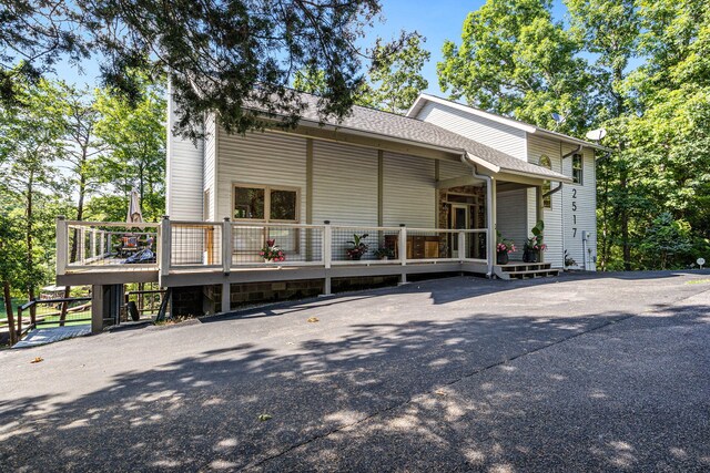 view of front of home with a deck