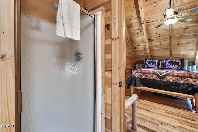 bedroom with wood ceiling and wood finished floors