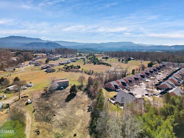 drone / aerial view featuring a mountain view