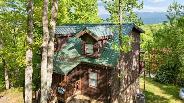2126 Loafers Glory Way, Gatlinburg, TN 37738 - exterior space featuring a lawn, a mountain view, central AC, and metal roof