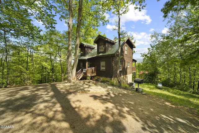 2126 Loafers Glory Way, Gatlinburg, TN 37738 - view of property exterior featuring covered porch and metal roof
