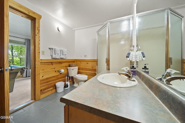 2126 Loafers Glory Way, Gatlinburg, TN 37738 - bathroom featuring tile patterned flooring, vanity, toilet, a wainscoted wall, and a shower stall