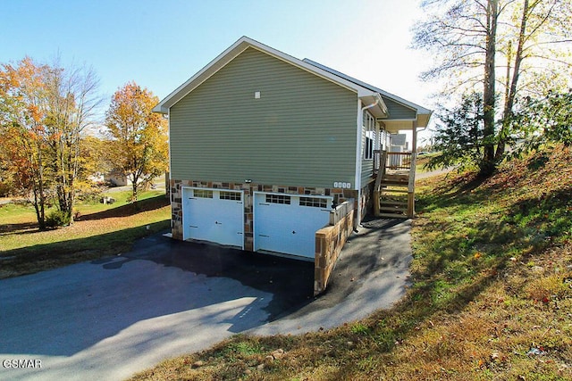 view of home's exterior featuring a garage