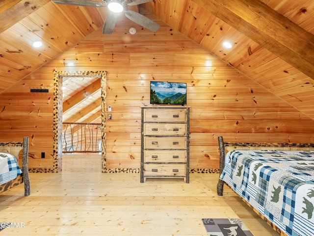 bedroom with hardwood / wood-style flooring, vaulted ceiling, and wooden ceiling