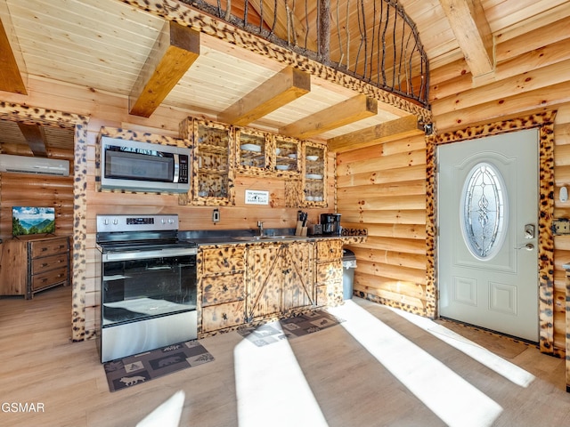 kitchen featuring beamed ceiling, wooden ceiling, rustic walls, and appliances with stainless steel finishes