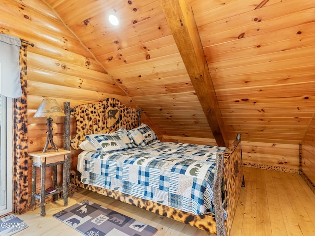 bedroom with hardwood / wood-style flooring, lofted ceiling with beams, and wooden ceiling