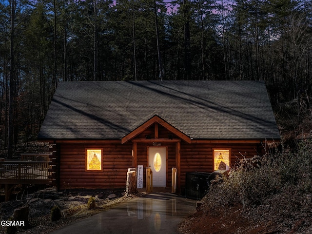 view of log cabin