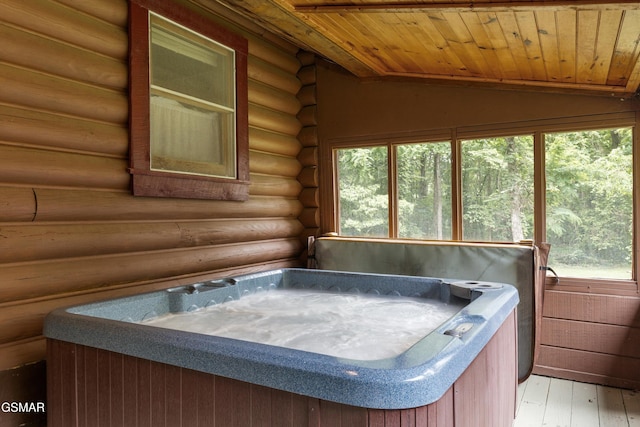 3114 Hatcher Top Rd, Sevierville, TN 37862 - miscellaneous room featuring a jacuzzi, rustic walls, wooden ceiling, vaulted ceiling, and hardwood / wood-style floors