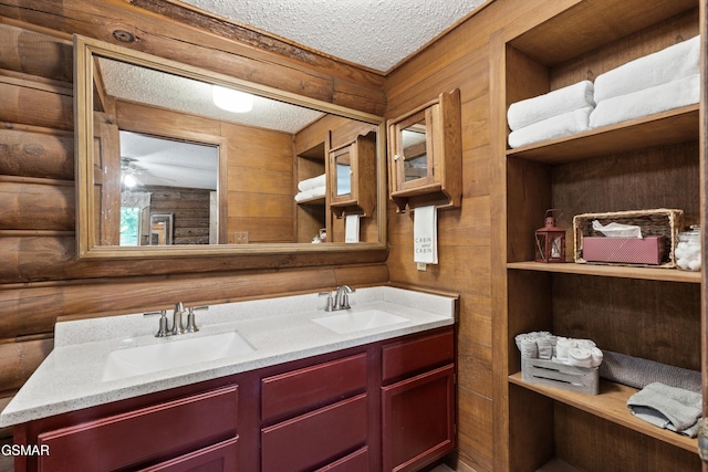 3114 Hatcher Top Rd, Sevierville, TN 37862 - full bathroom featuring a textured ceiling and double vanity