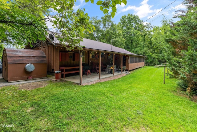 3114 Hatcher Top Rd, Sevierville, TN 37862 - view of green lawn featuring a patio