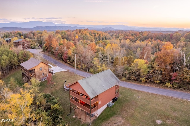 410 Oak Sky Way, Sevierville, TN 37876 - aerial view of property and surrounding area with a heavily wooded area and a mountainous background