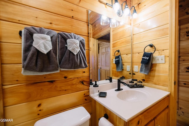 410 Oak Sky Way, Sevierville, TN 37876 - half bathroom with vanity and wood walls