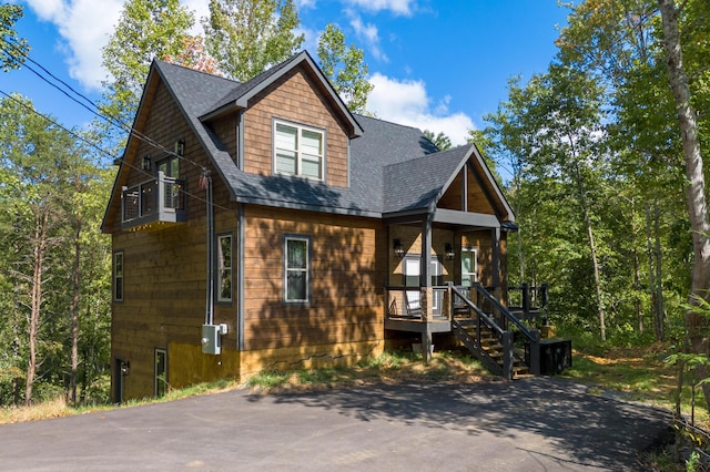 1650 Lake Dr, Gatlinburg, TN 37738 - rustic home with a porch and a shingled roof
