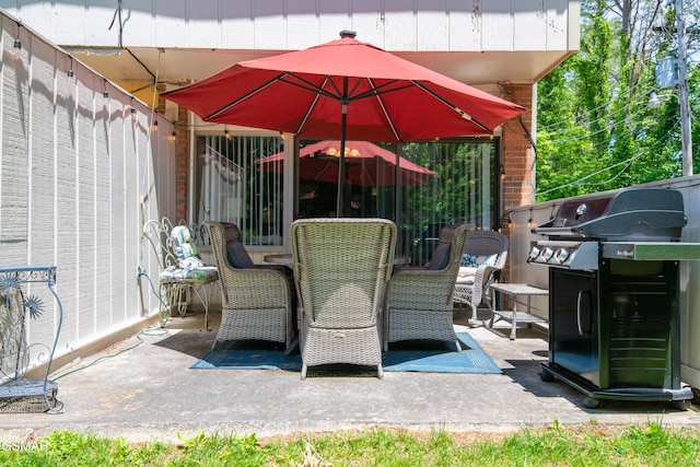 view of patio / terrace with a grill