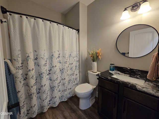 708 Lakeside Ct, Dandridge, TN 37725 - full bathroom featuring wood finished floors, vanity, toilet, and curtained shower