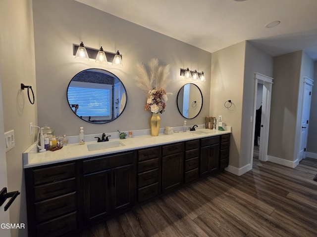 708 Lakeside Ct, Dandridge, TN 37725 - bathroom with double vanity, wood finished floors, and baseboards