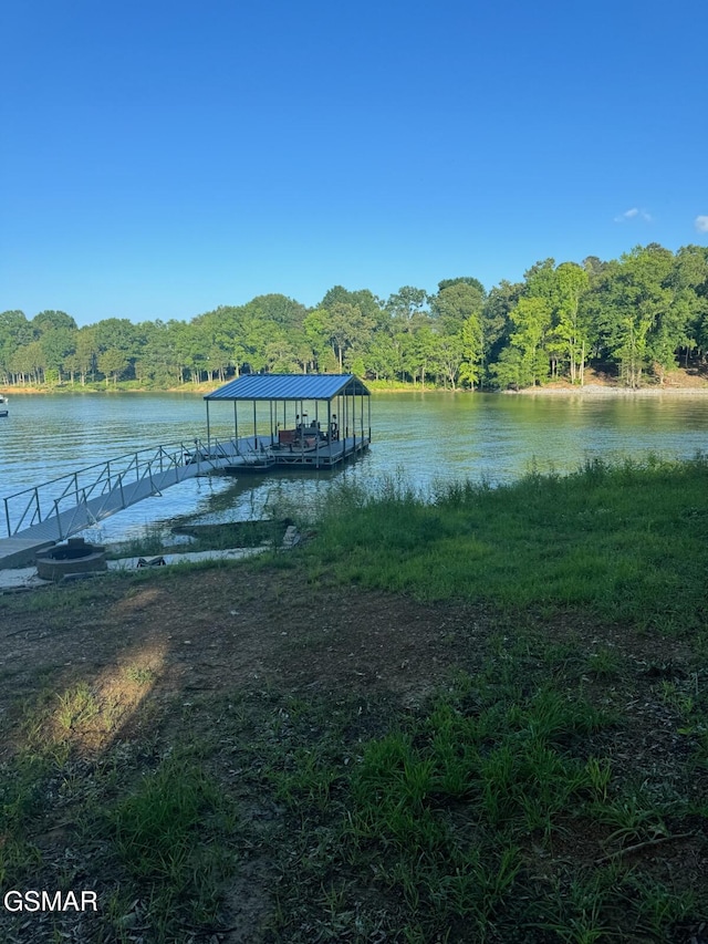 708 Lakeside Ct, Dandridge, TN 37725 - dock featuring a water view, a forest view, and boat lift