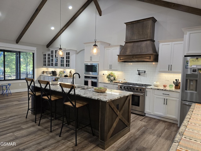 708 Lakeside Ct, Dandridge, TN 37725 - kitchen featuring appliances with stainless steel finishes, a sink, custom range hood, white cabinets, and recessed lighting