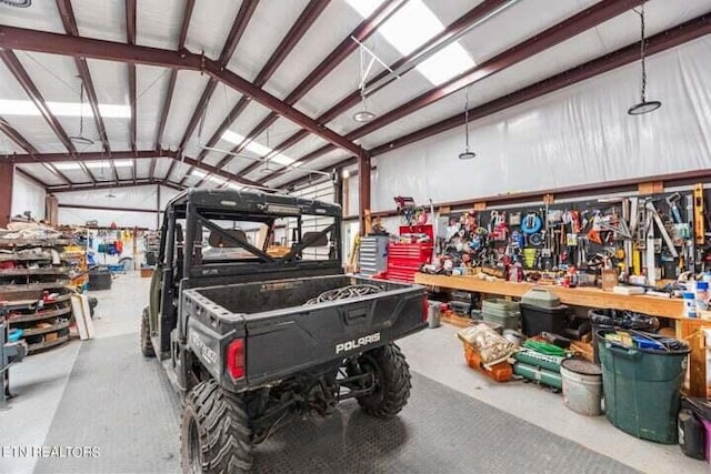 garage with a workshop area