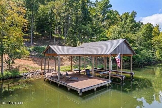 view of dock with a water view