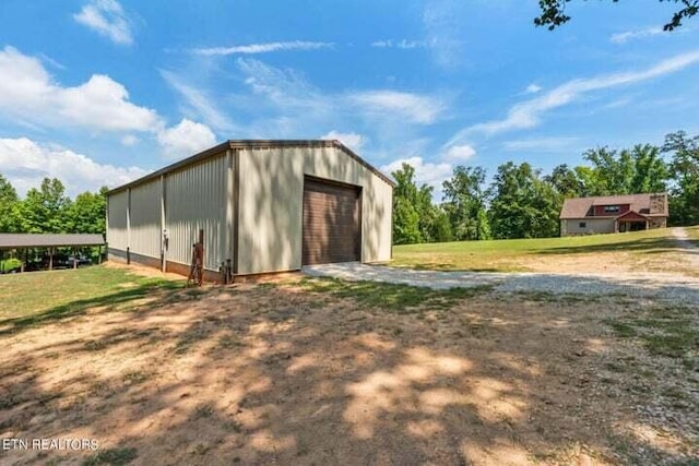 view of outdoor structure featuring a garage