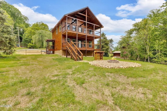 2641 Willow Heights Way, Sevierville, TN 37876 - rear view of property with stairs, a wooden deck, and an outdoor fire pit