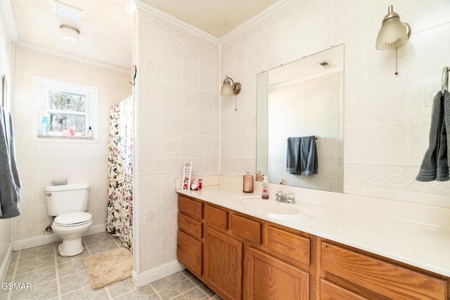 bathroom featuring tile walls, vanity, toilet, crown molding, and a shower with shower curtain