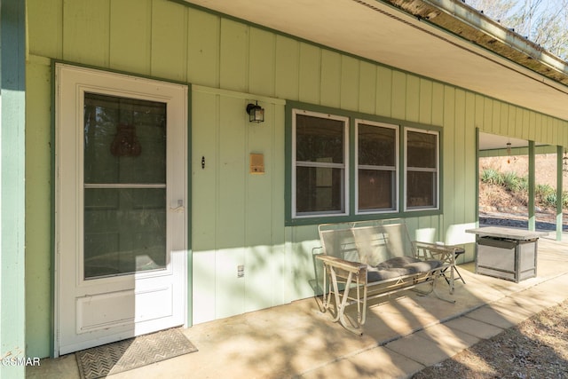 doorway to property featuring a patio