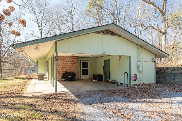 exterior space with a carport