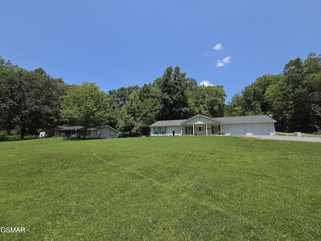 2865/2869 Happy Hollow Rd, Sevierville, TN 37862 - single story home with a front yard, driveway, and a garage