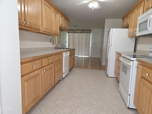 2865/2869 Happy Hollow Rd, Sevierville, TN 37862 - kitchen featuring white appliances, ceiling fan, light countertops, and light tile patterned floors