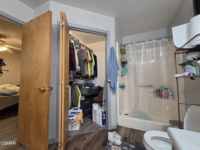 2865/2869 Happy Hollow Rd, Sevierville, TN 37862 - full bath with wood finished floors, curtained shower, ceiling fan, and connected bathroom