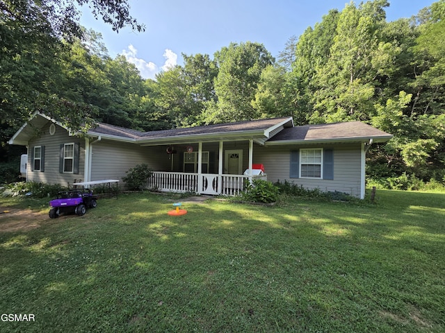 2865/2869 Happy Hollow Rd, Sevierville, TN 37862 - ranch-style home with a porch and a front lawn