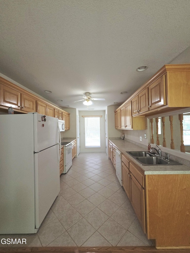 2865/2869 Happy Hollow Rd, Sevierville, TN 37862 - kitchen featuring white appliances, a ceiling fan, light tile patterned floors, a textured ceiling, and light countertops