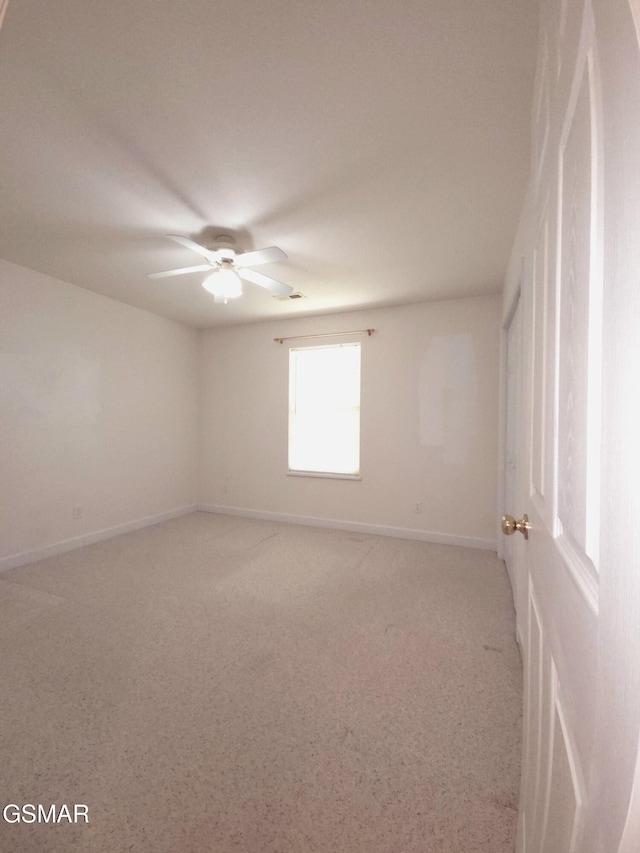 2865/2869 Happy Hollow Rd, Sevierville, TN 37862 - empty room with ceiling fan and light colored carpet