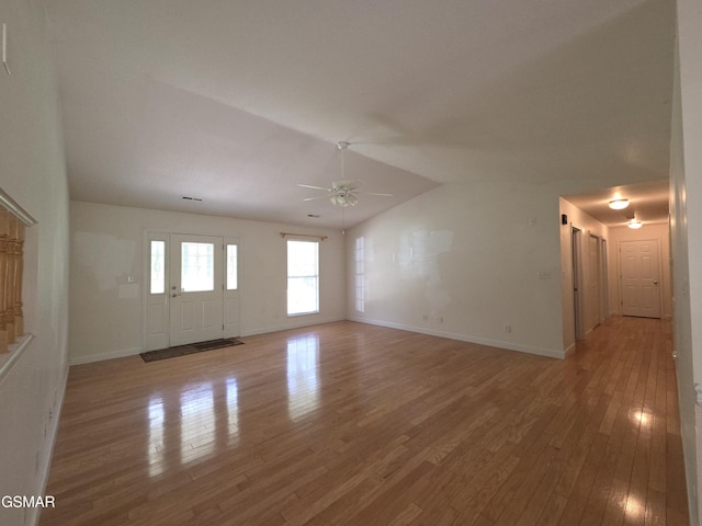 2865/2869 Happy Hollow Rd, Sevierville, TN 37862 - unfurnished living room with ceiling fan, wood finished floors, and lofted ceiling