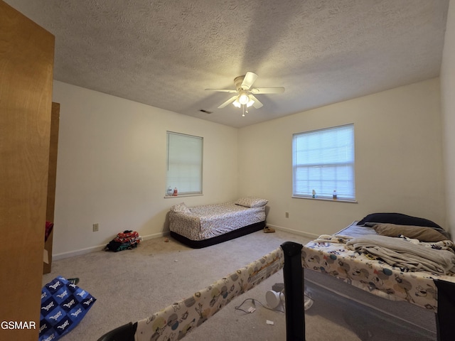 2865/2869 Happy Hollow Rd, Sevierville, TN 37862 - carpeted bedroom featuring ceiling fan and a textured ceiling